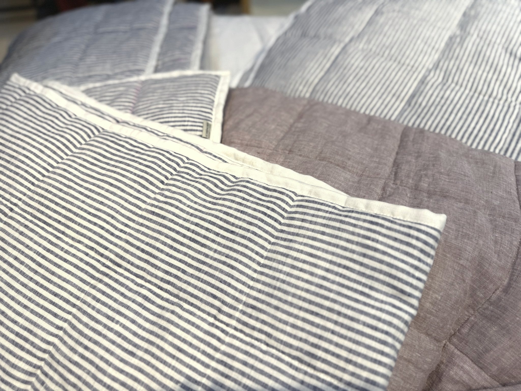 Hand-Quilted French Linen Blanket – Navy Pinstripe