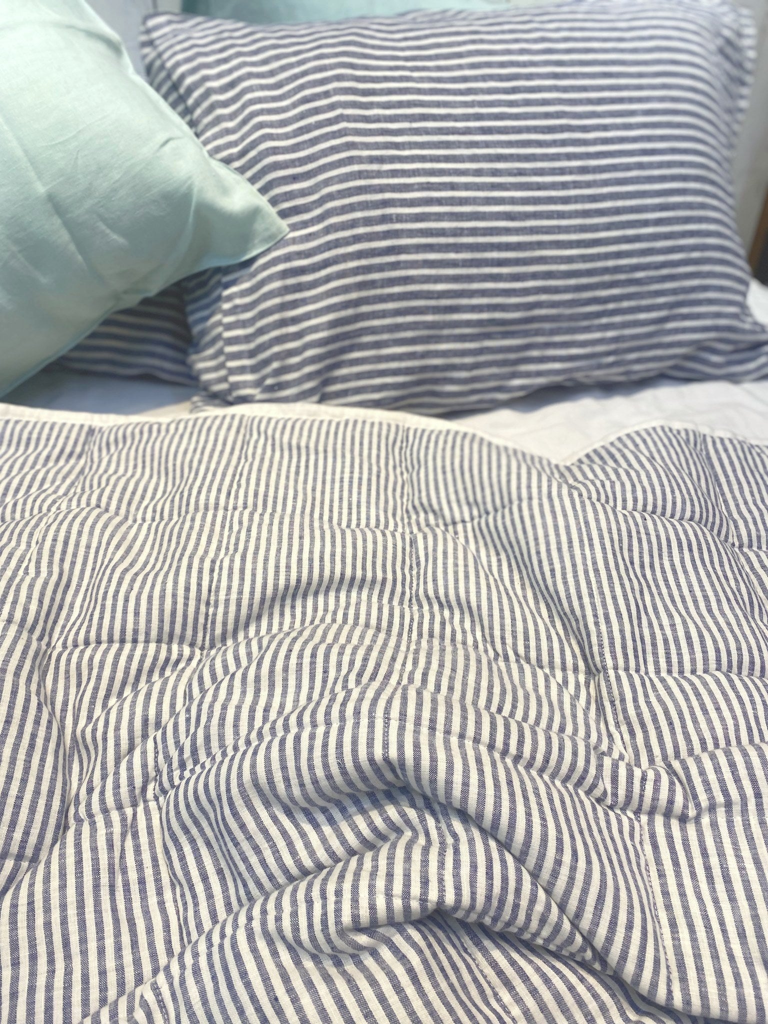 Hand-Quilted French Linen Blanket – Navy Pinstripe