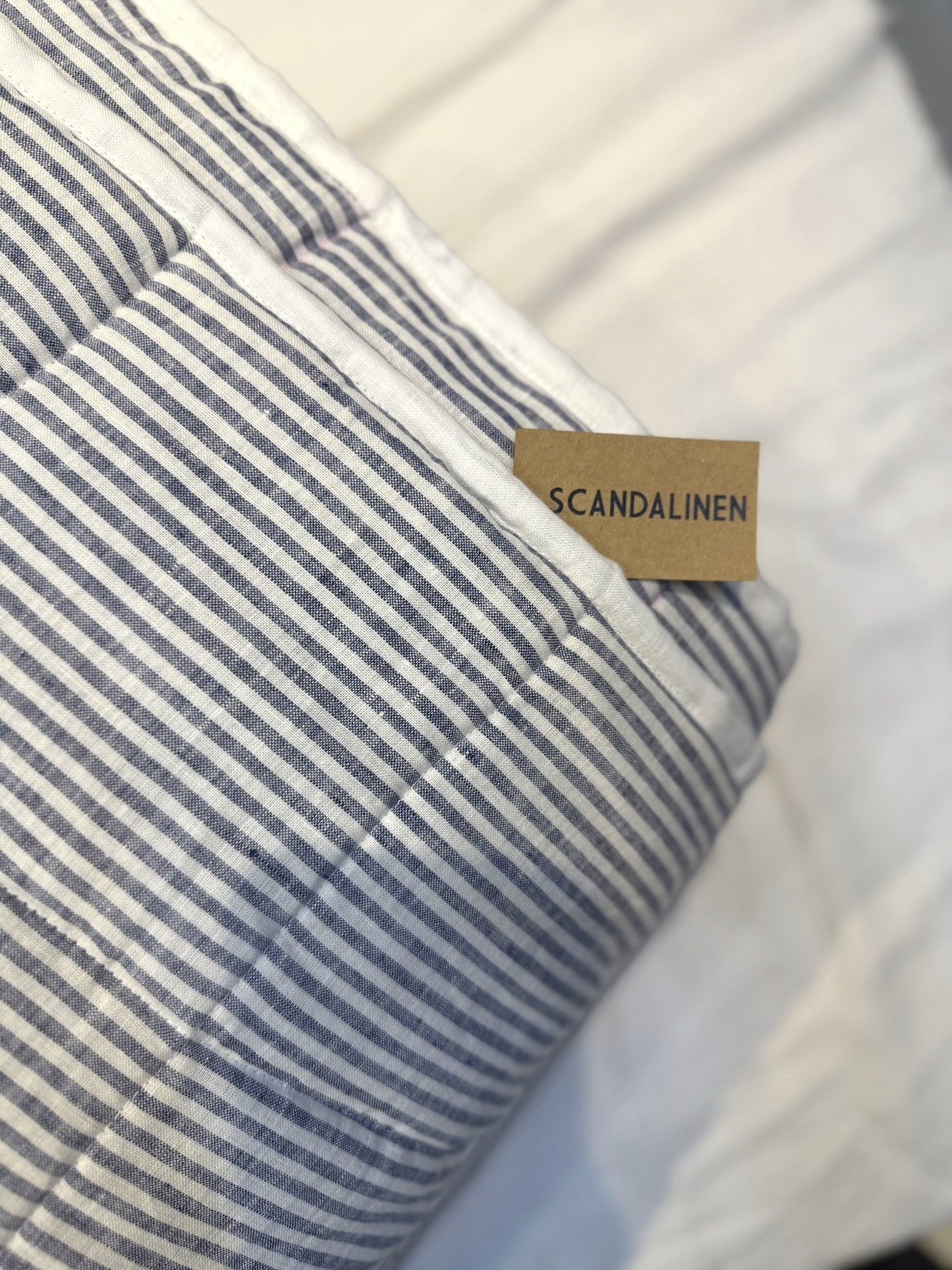 Hand-Quilted French Linen Blanket – Navy Pinstripe