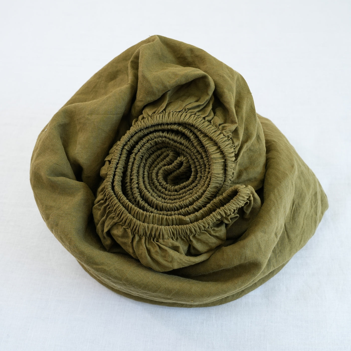 Olive French linen fitted sheet detail
